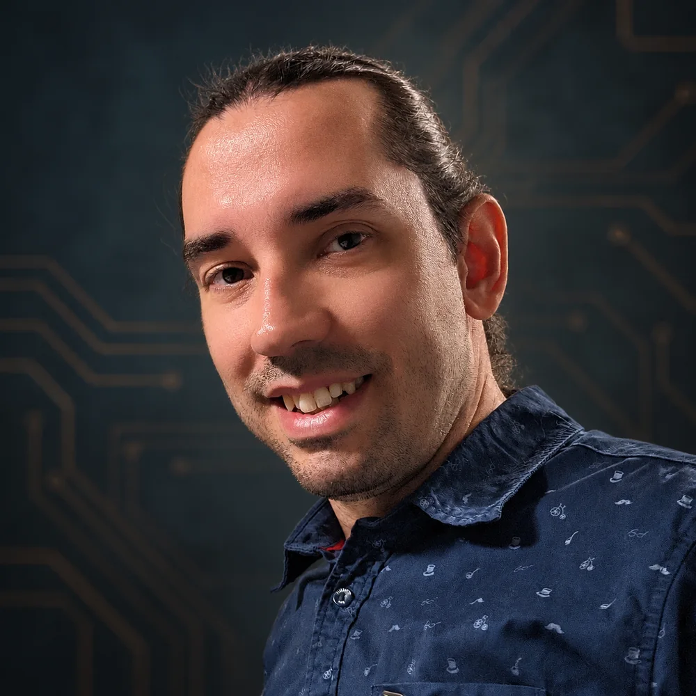 Julian Pastarmov smiling against a dark graphite technical backdrop